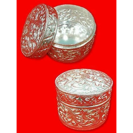 Silver groves for kumkum, sandalwood, etc.
